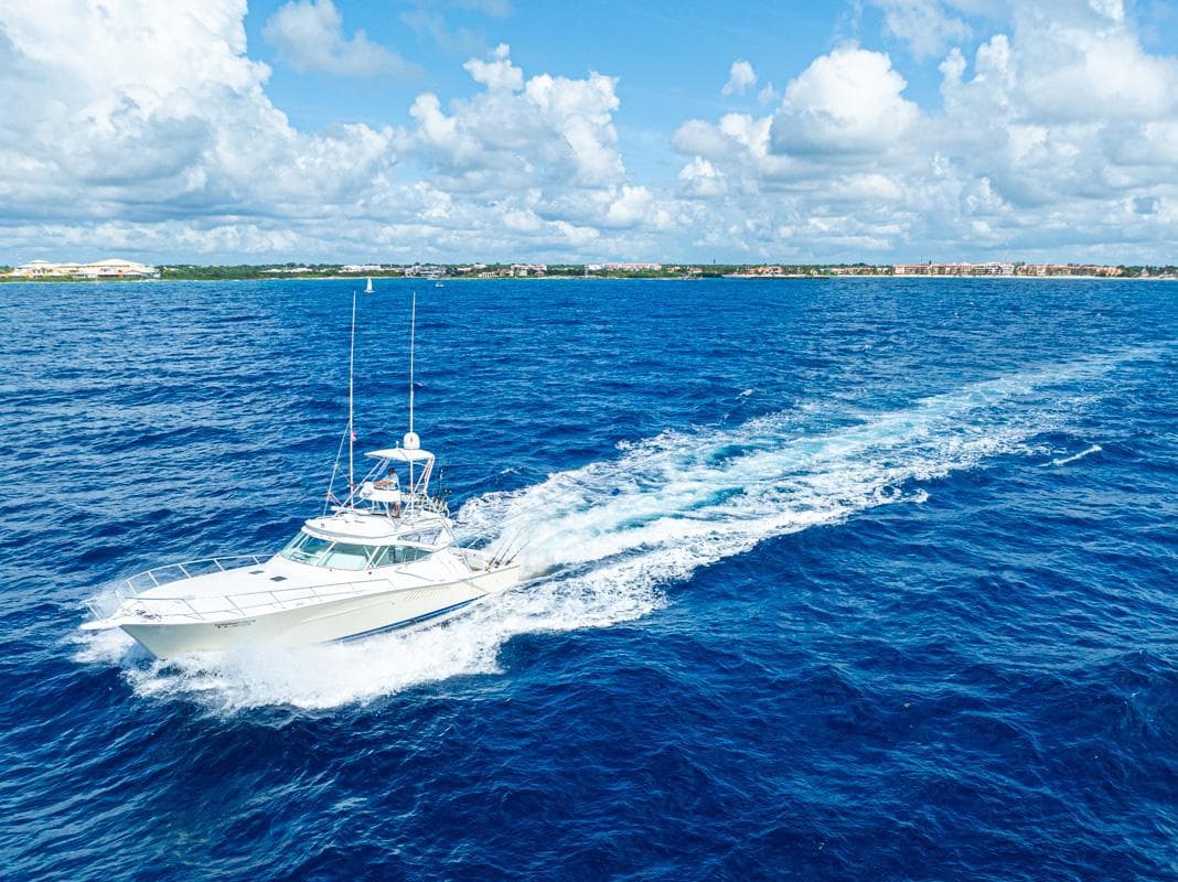 Aerial view of a charter fishing boat in bluewater